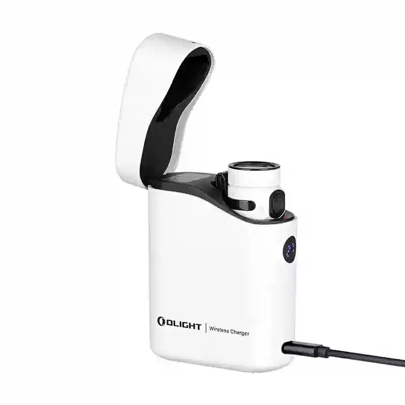 White wireless charger with black accents on a white background